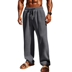 Vista detallada de pantalones de pana gris oscuro para hombre con cordón elástico