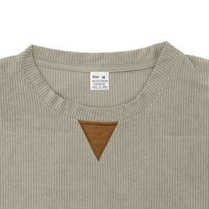 Detail of khaki corduroy sweatshirt crewneck with decorative V-patch and ribbed collar