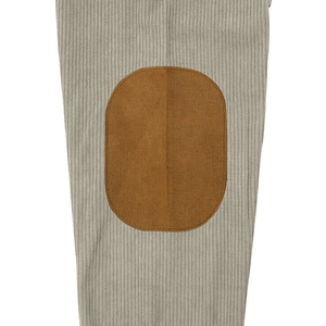 Detailed close-up of light gray corduroy fabric texture with a brown suede elbow patch
