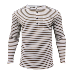 Detail of white and brown striped long-sleeve Henley shirt with buttons and chest pocket
