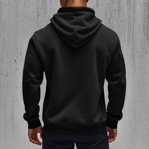 Back view of black hooded sweatshirt with ribbed cuffs and cargo pocket on the sleeve