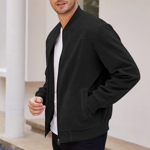 Detail of men's black faux suede bomber jacket with ribbed collar and metal zipper