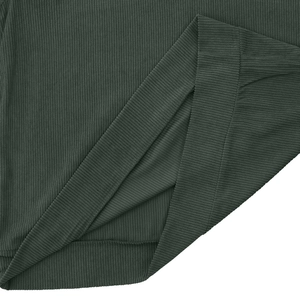 Close-up of dark green ribbed corduroy fabric texture and high-quality stitching detail