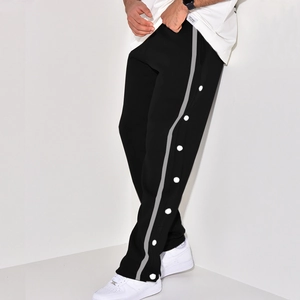 Detail view of men's casual black trousers featuring side grey stripes and snap buttons