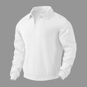 Macro shot of white long sleeve polo shirt with textured geometric jacquard fabric