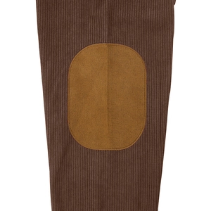 Detail of brown corduroy sweatshirt sleeve with camel oval reinforced elbow patches