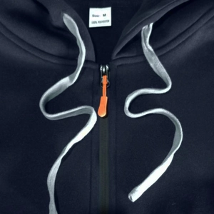 Close-up of hoodie collar with orange zipper detail and 100% polyester size M label