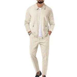 Close-up detail of beige waffle knit texture on men's zip-up jacket and trousers set