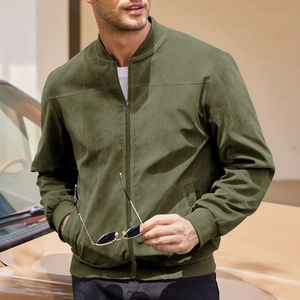 Detailed close-up of an olive green suede bomber jacket with ribbed cuffs and metal zipper
