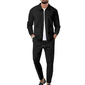 Close-up detail of waffle texture fabric and side zipper pocket on men's black jacket set