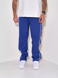 Men's retro blue straight leg joggers with side stripes and snap buttons at the hem