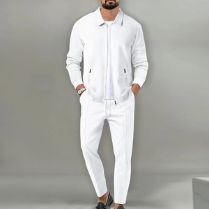 Men's white waffle knit tracksuit featuring a zippered jacket and matching pants