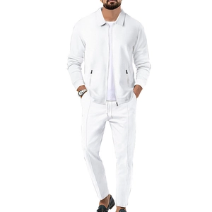 Detailed macro view of white waffle textured fabric on men's zip jacket and trouser set