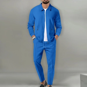 Detail of royal blue waffle knit texture on men's slim fit zipper jacket and pants