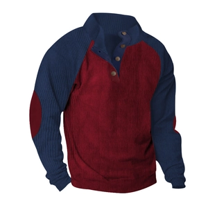 Detail of color block corduroy Henley shirt with raglan sleeves and elbow patches