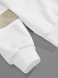 Close-up of ribbed cuffs on American retro color-block polo shirt for men