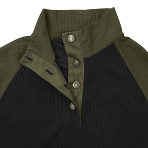 Detail view of corduroy texture and vintage metal buttons on the high collar sweatshirt