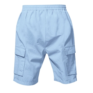 Close-up of light blue cargo shorts featuring elastic waist and large side flap pockets