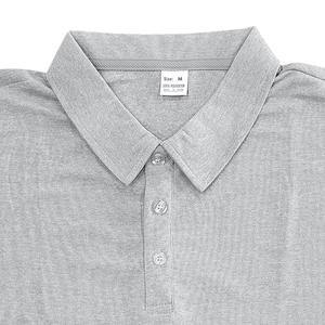 Detail view of grey polo shirt collar with size M label and clear resin buttons
