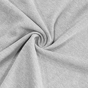 Macro detail of the light grey polo shirt fabric showing soft texture and fine weave