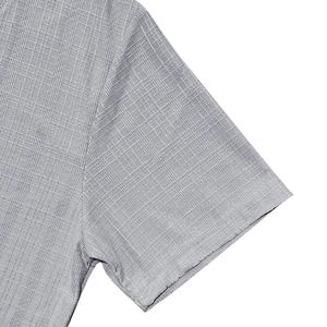 Detailed macro view of gray men's V-neck T-shirt showing waffle texture and stitching