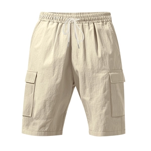 Detail view of men's lightweight linen cargo shorts featuring elastic drawstring waist