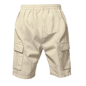 Detailed close-up of light beige cargo shorts with elastic drawstring waist and side pockets