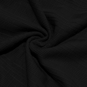 Macro view of black slub fabric texture with vertical stripes for summer Henley shirt