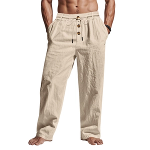 Detail view of men's linen pants showing elastic drawstring waist and decorative buttons