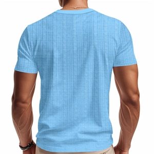 Close-up of light blue men's T-shirt showing detailed slub linen-like mesh texture