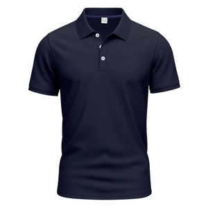 Detail of navy blue polo shirt featuring white buttons and a textured bird-eye mesh fabric