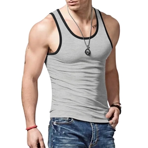 Detailed view of light grey ribbed tank top with black contrast trim and slim fit cut