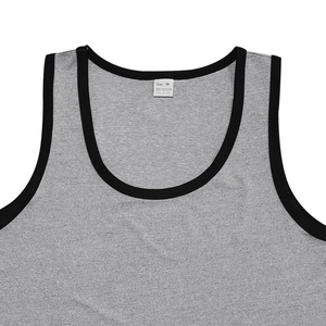 Detail of grey quick-dry tank top showing black piping on the collar and fabric texture