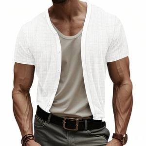 Close-up of men's white V-neck short sleeve shirt with textured waffle knit fabric
