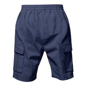 Detail view of the elastic waistband and cargo pockets on dark blue men's shorts