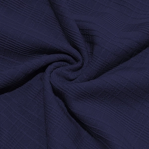 Close-up of high-quality dark purple slub knit fabric texture for men's Henley T-shirt