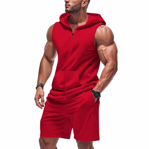 Detail of red sleeveless zip-up hoodie and matching sports shorts set for men