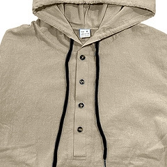 Detail view of cotton linen shirt collar with four buttons and contrast black drawstrings