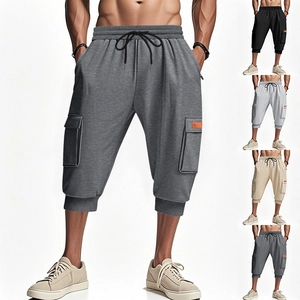 Detailed view of cargo shorts with drawstring elastic waist and 3D flap side pockets