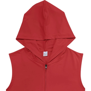 Detail view of red hooded vest label showing 95% polyester and size L info