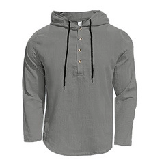 Detail of grey cotton linen hoodie shirt featuring wooden buttons and adjustable drawstring