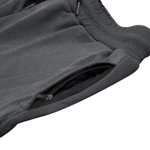 Detail view of dark grey heavy duty cargo shorts with drawstring waist and zipper pocket