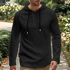 Detail of black cotton linen hoodie with Henley neckline buttons and drawstring hood