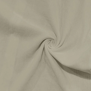 Macro textura de tela beige de algodón y lino mostrando tejido natural y pliegues suaves
