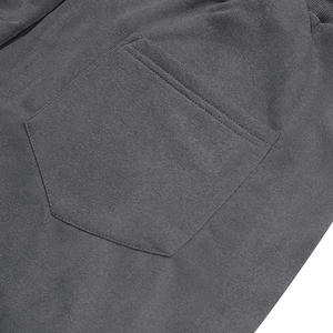 Detailed view of dark grey cargo shorts featuring double-needle stitching on side pockets