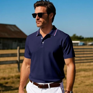 Detail of navy blue men's polo shirt with red, white and blue striped collar trim