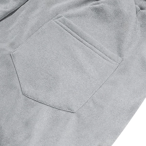 Close-up of grey cargo shorts featuring heavy-duty knit texture and reinforced rear pockets