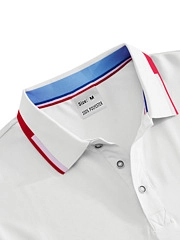 Close-up of white polo shirt collar with red, white, and blue striped neckband detail