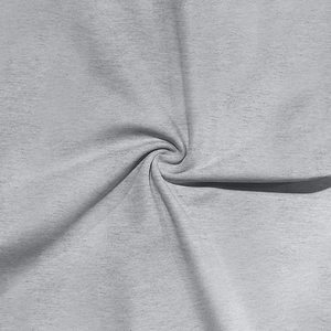 Detail shot of light gray knit fabric showing soft texture and flexibility in spiral fold