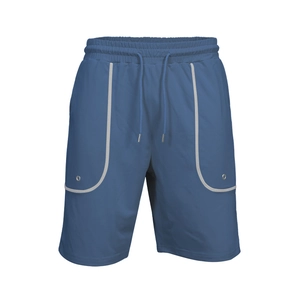 Detail view of blue athletic shorts showing elastic waistband and grey pocket piping trim